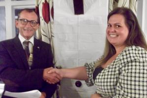 President Perry welcomes new member Jenna.